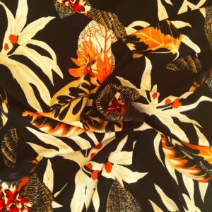 Tissu viscose - Feuilles et fleurs tropicales sur fond noir